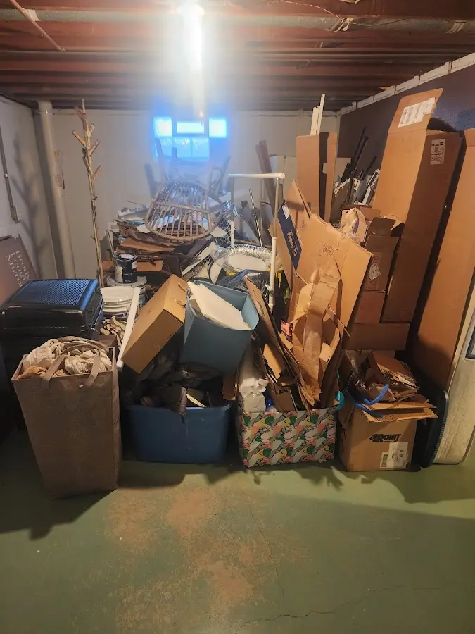 Roll-off dumpster container at job site for 2 Yard Dumpster Rental in Pepperell